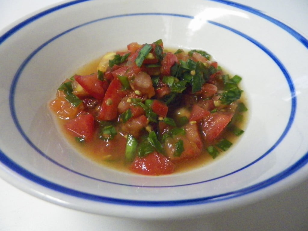Bowl of Fresh Homemade Gluten Free Tomato and Chive Salsa with Lime